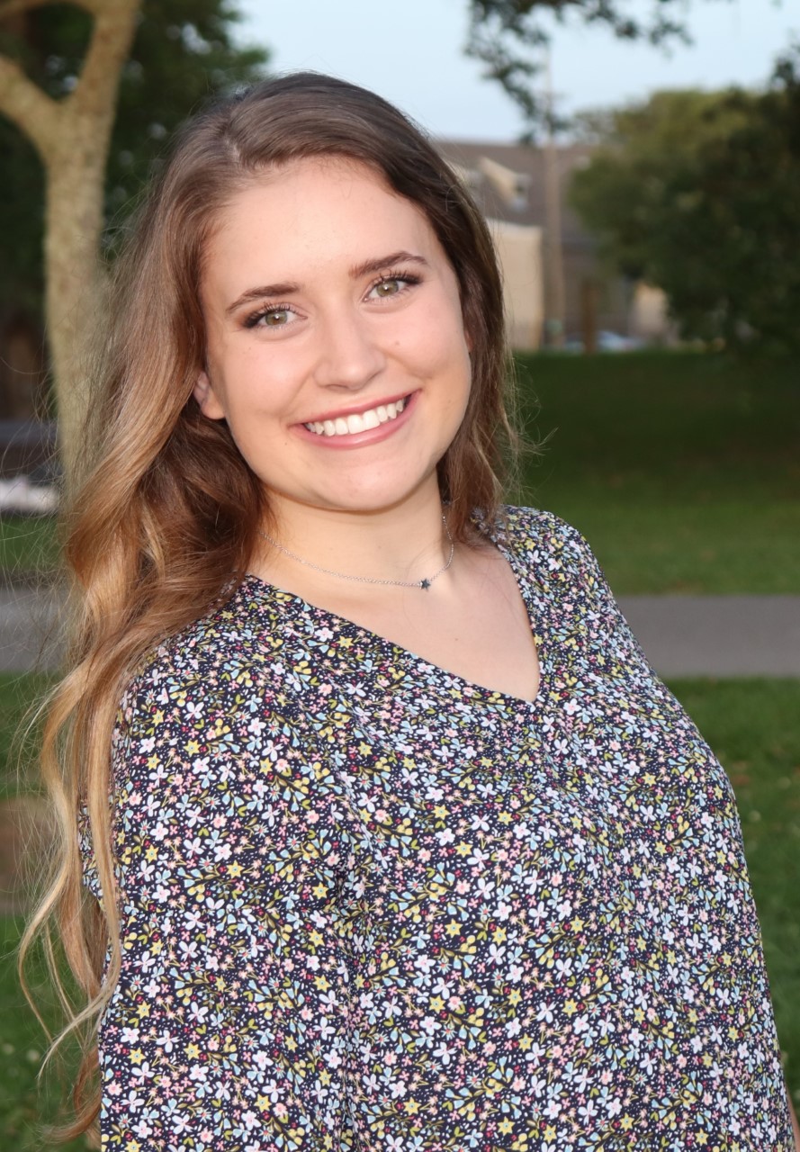 headshot photo of Naomi Westbrook smiling.