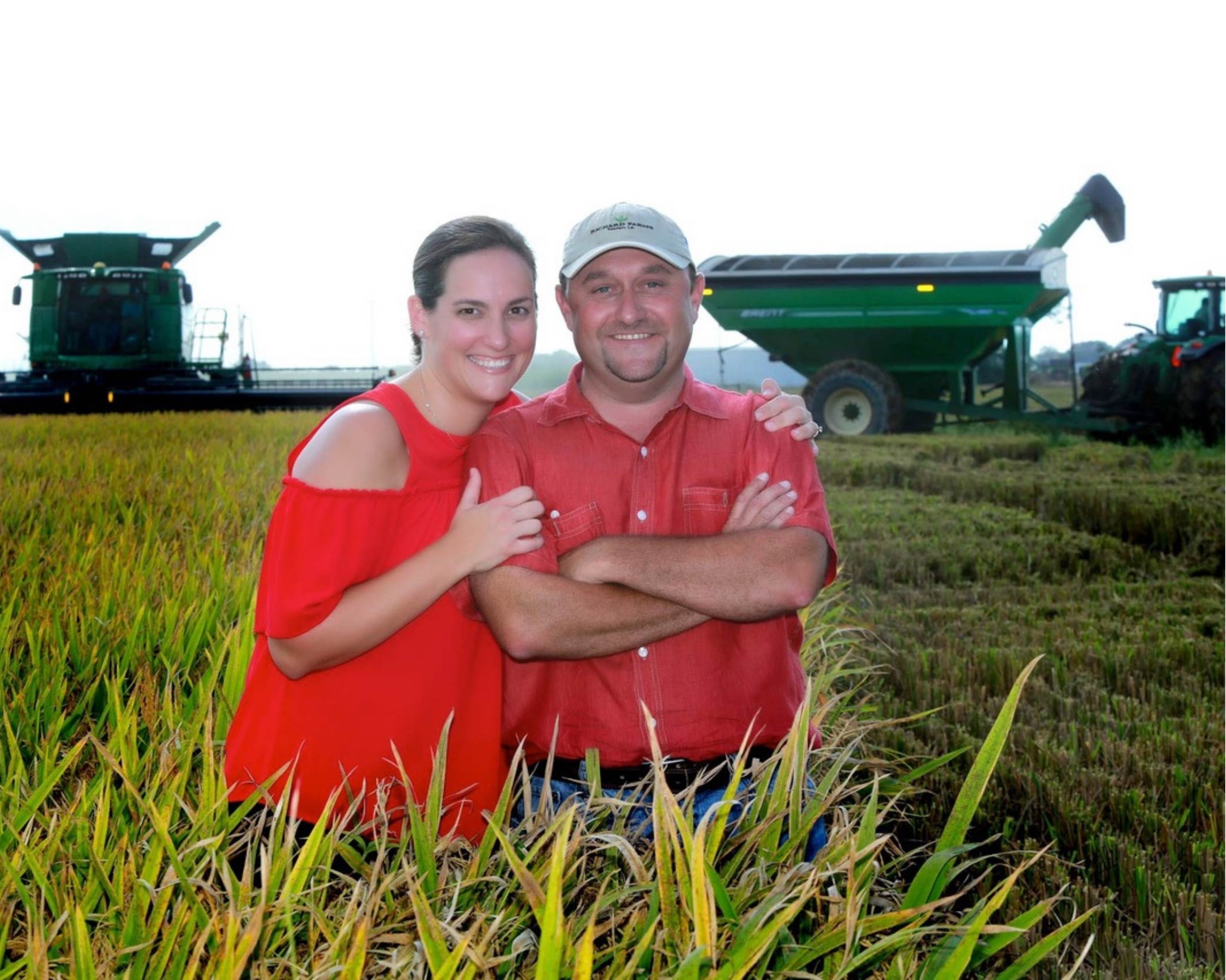 alumni in field during harvest