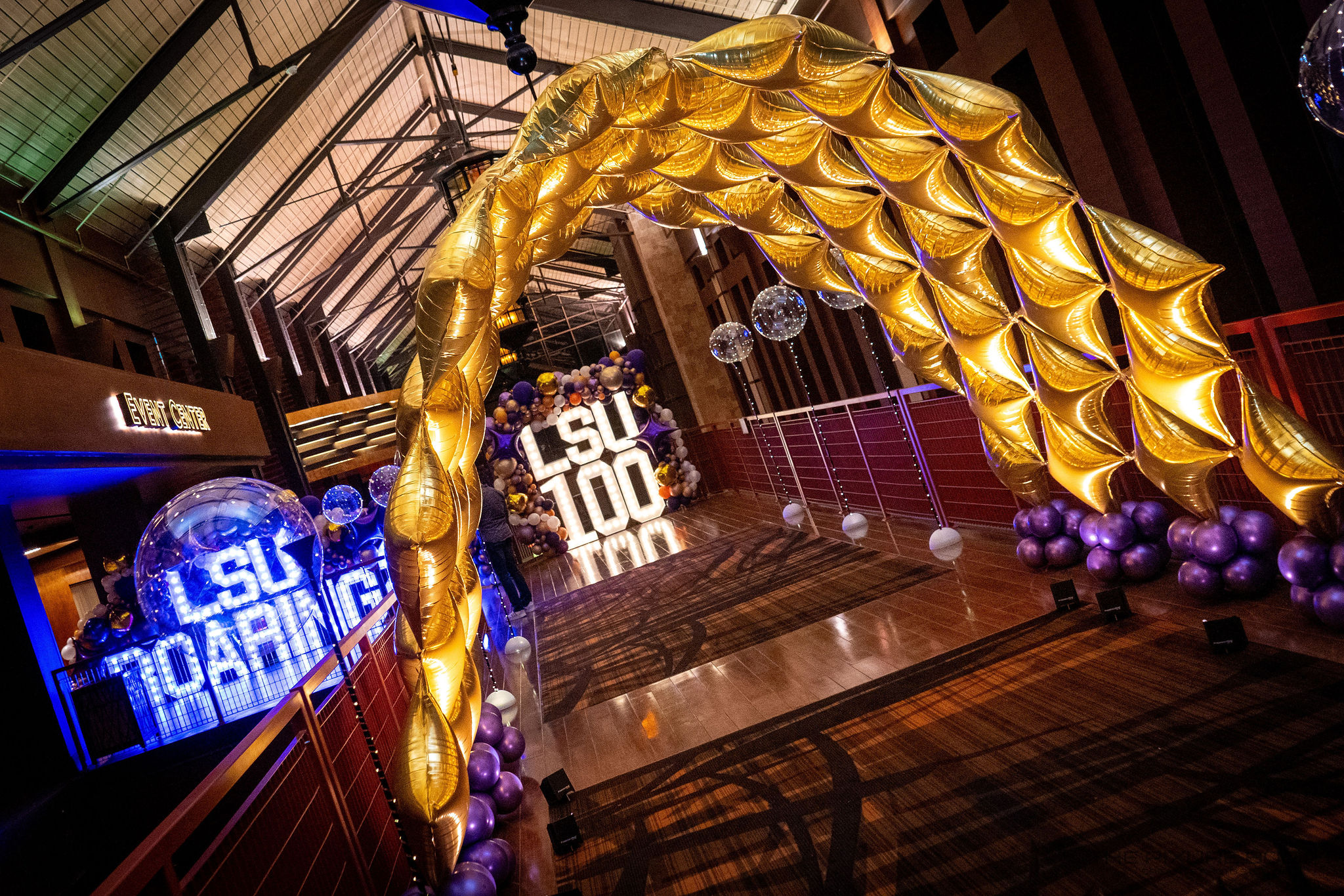 Balloons and lights that spell out LSU100 