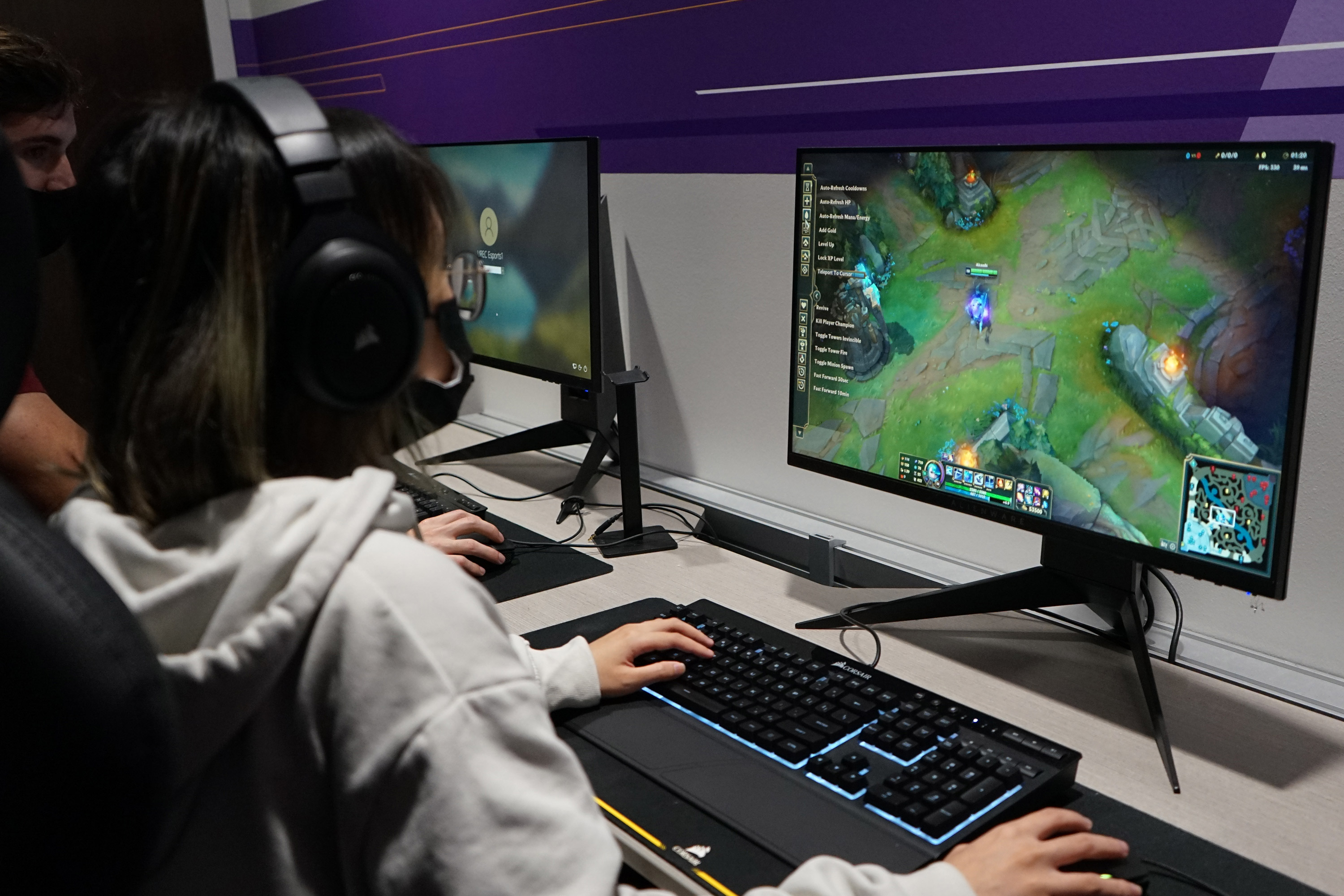 patron playing a game on one of our esports area computers